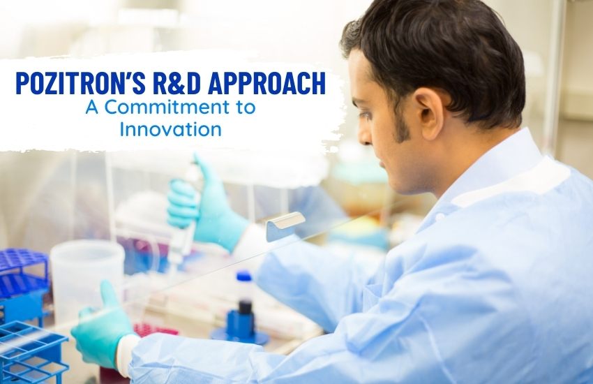 Scientist in a blue lab coat conducting chemical research in a laboratory, representing Pozitron Chemtech's commitment to innovation in R&D.
